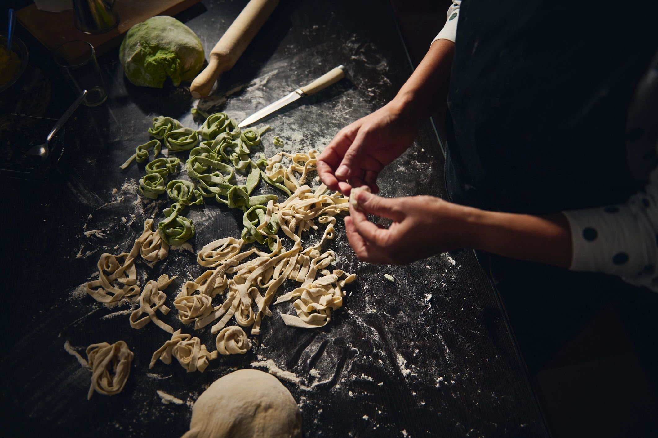 Fresh pasta being prepared by hand
